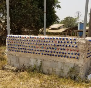 Stacked Recycled Plastic Bottles Wall